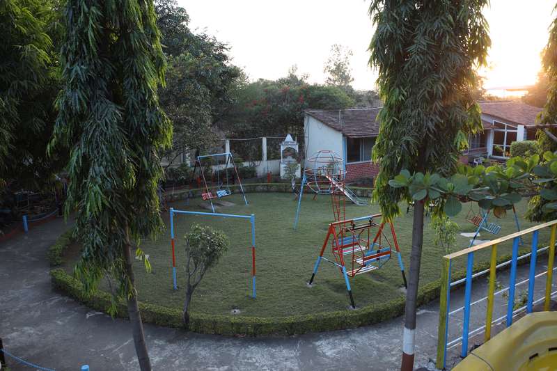Swimming pool with sun loungers at Fun and Food Resort