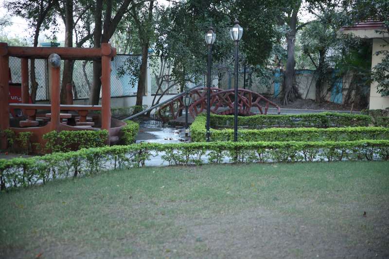 Luxury AC room interior at Fun and Food Resort Indore